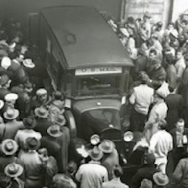 Strikers surround a mail truck, Oakland General Strike, 1946
